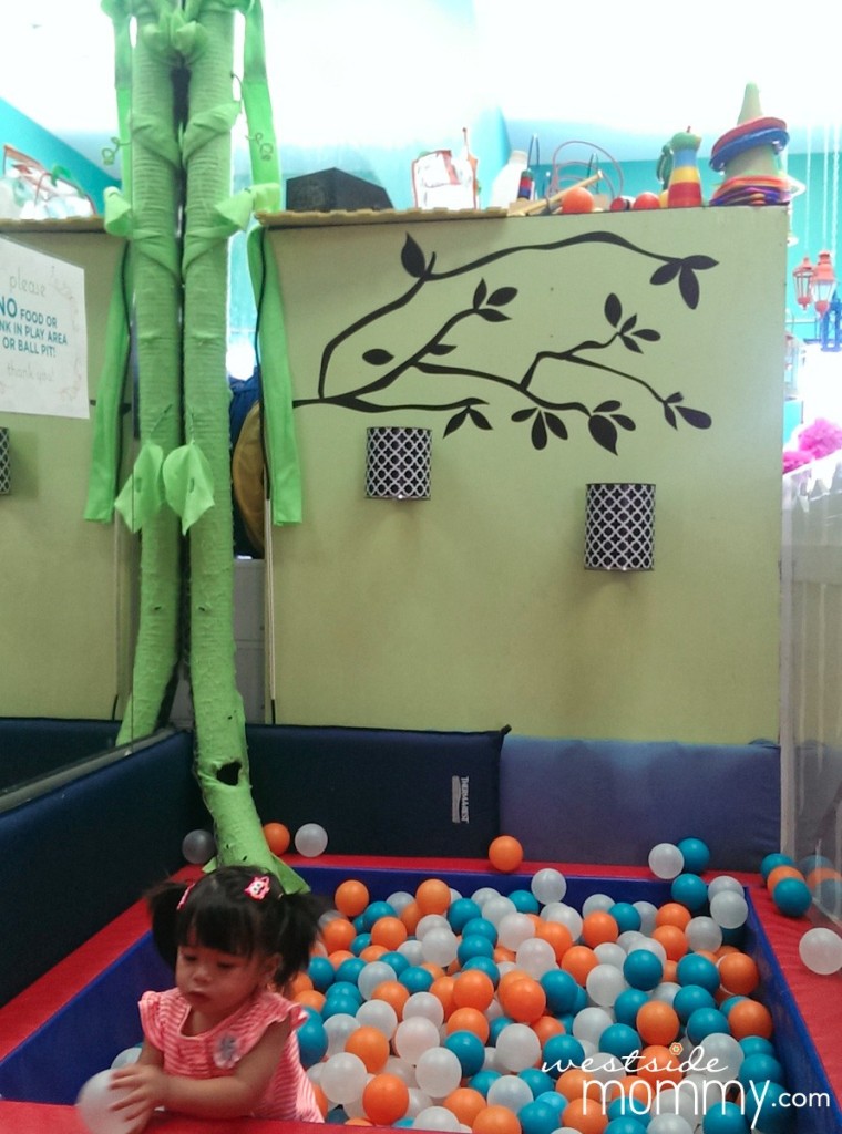 My daughter Aria in the ballpit at Pamper & Play